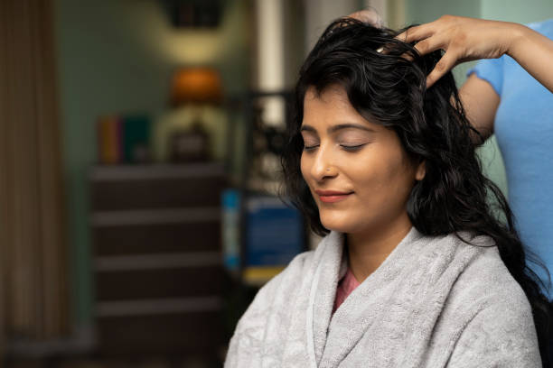 Woman hair massage at home